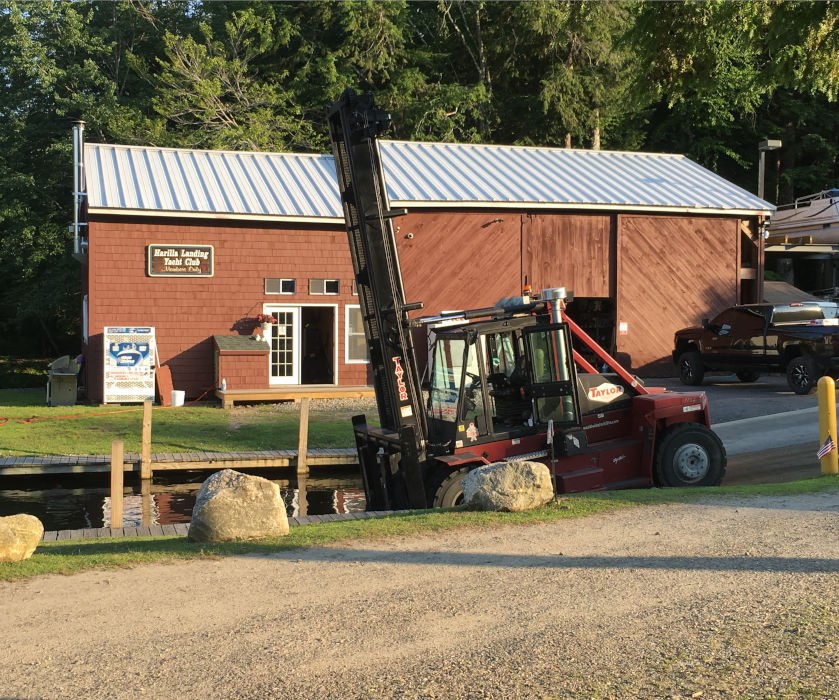 Harilla Landing Yacht Club building and Taylor forklift